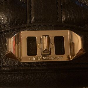 Love bag. Quilted black with gold hardware. Great condition.  10”x6”x3.5”